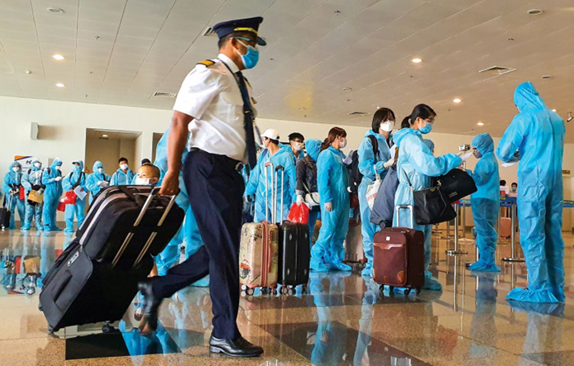 Cục Hàng không cho rằng các đánh giá, dự báo tình hình vận tải hàng không năm 2021 sẽ cải thiện so với năm 2020, đặc biệt vào nửa cuối năm 2021 khi việc tiêm vắc xin ngừa COVID-19 được đẩy nhanh tại Việt Nam. (Nguồn ảnh: nguoi-viet.com)